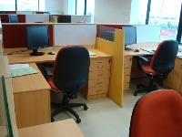 wood grain laminate used with coloured elements in the work stations.